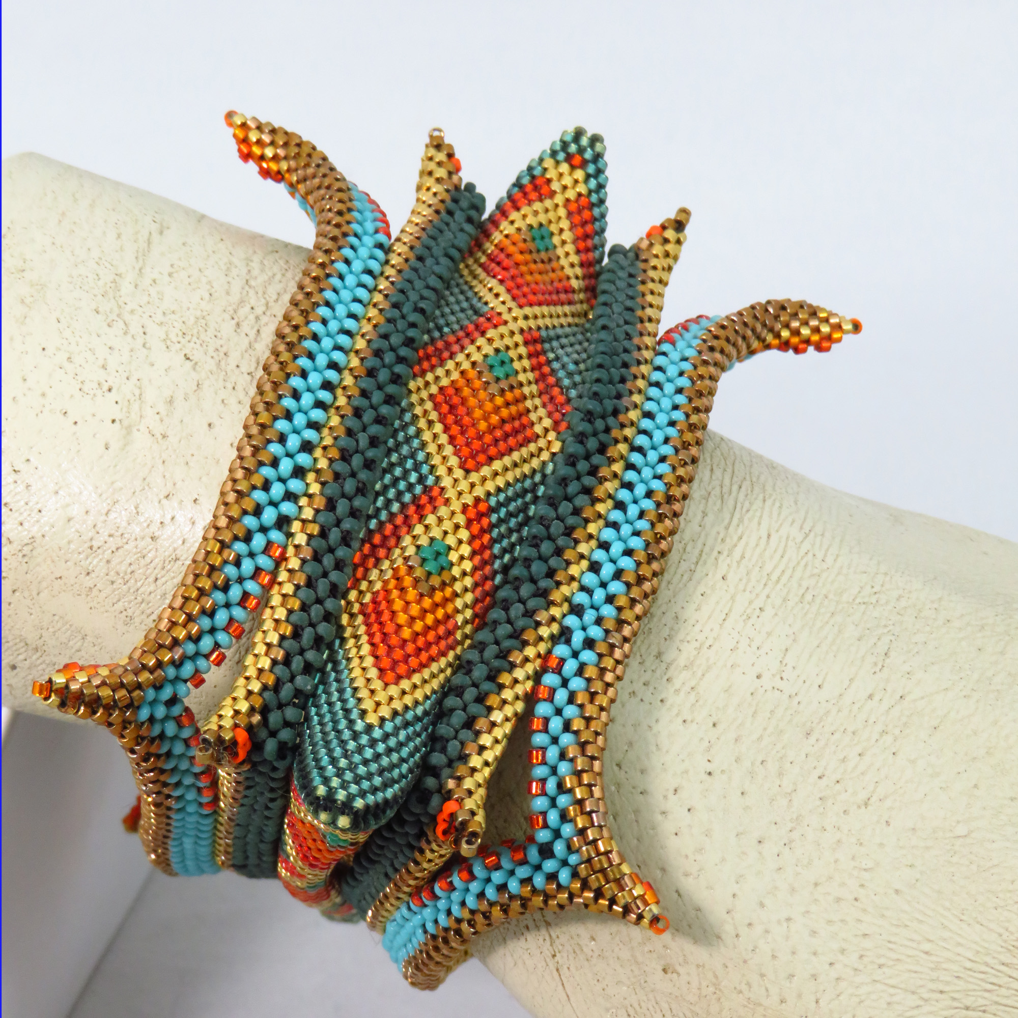 Contemporary geometric triangular beaded spike bangle bracelet by Bonnie Van Hall 