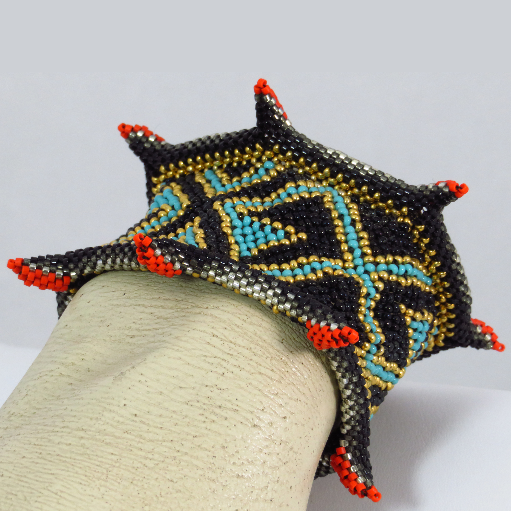 Geometric spirals patterned cuff bracelet by Bonnie Van Hall