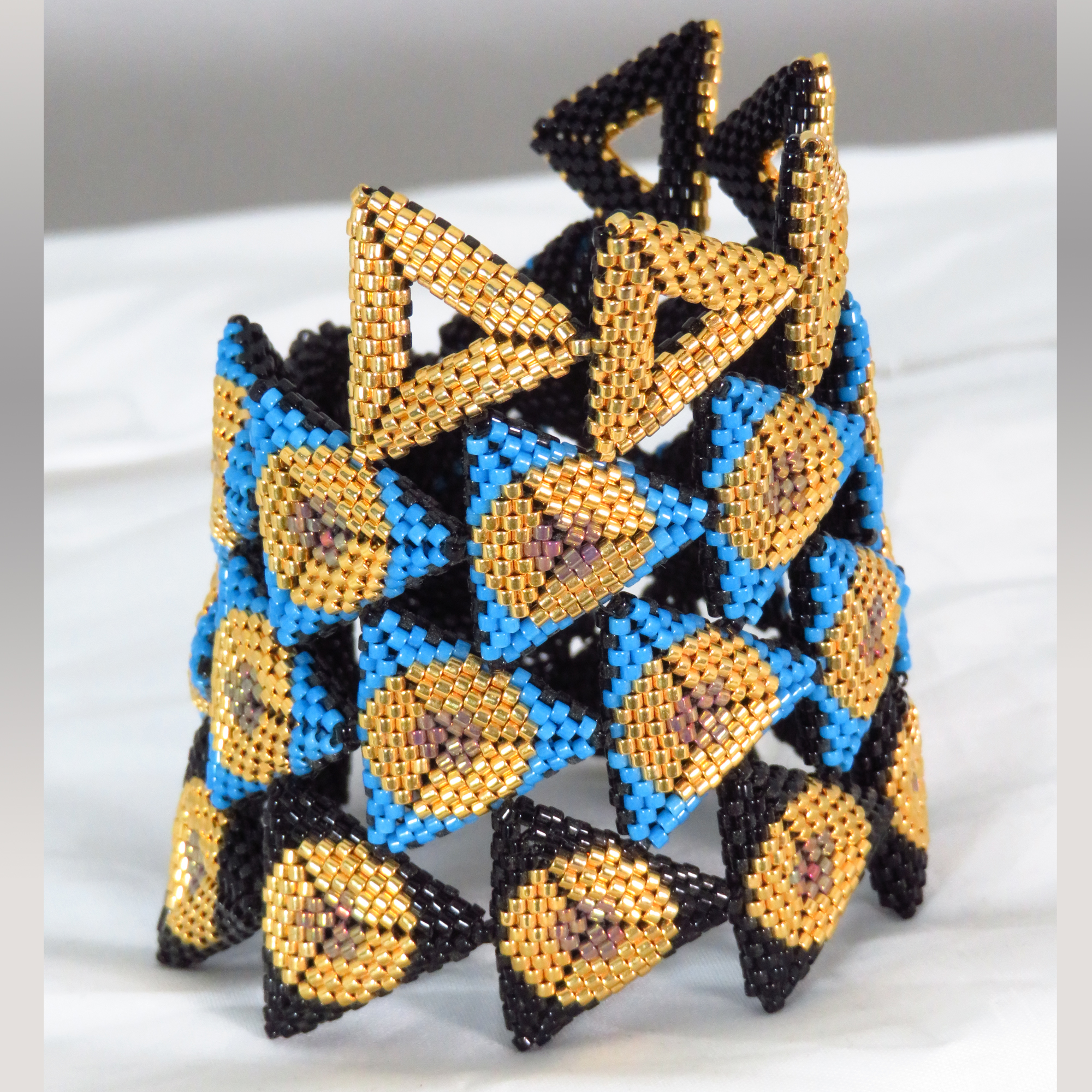 Contemporary geometric triangles beaded cuff bracelet by Bonnie Van Hall